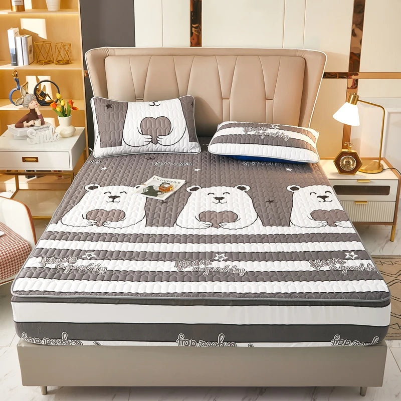 Bed with cartoon bear design mattress cover in a bedroom setting