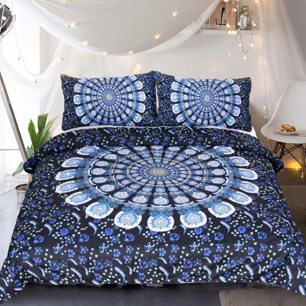 Blue and black mandala patterned bedding set on a bed in a room with string lights.