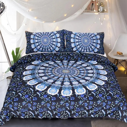 Blue and black mandala patterned bedding set on a bed in a room with string lights.