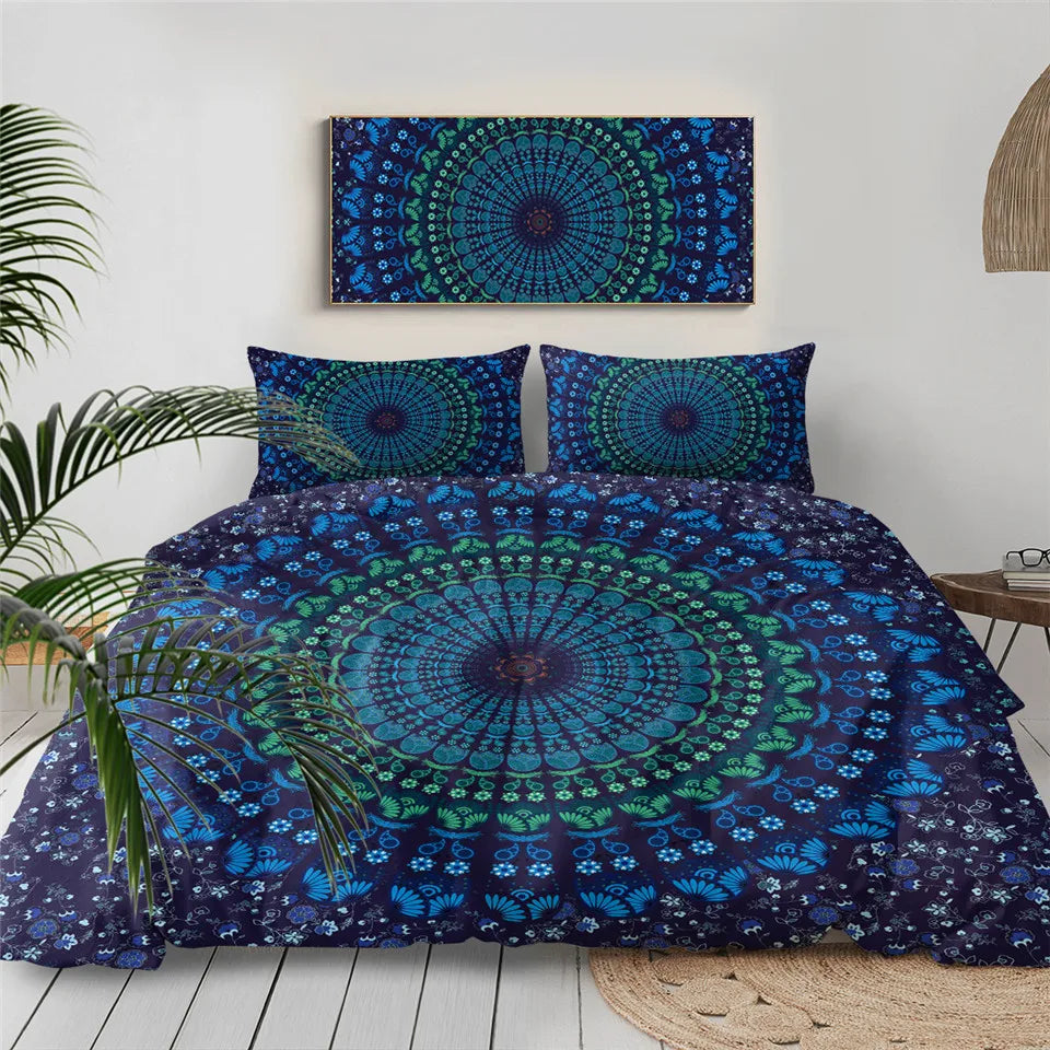 Blue and green mandala patterned bedding set on a bed with matching wall art.