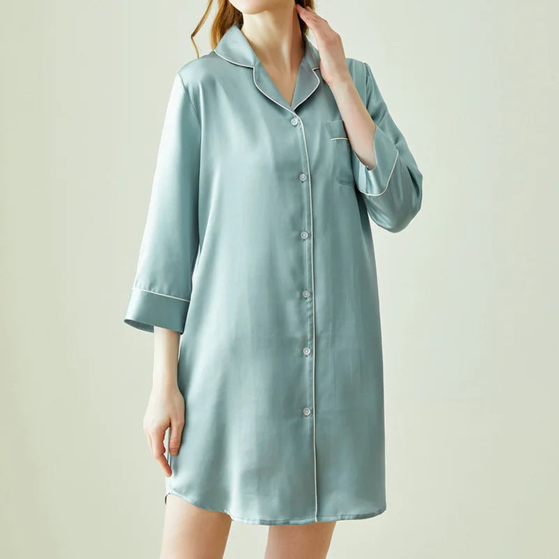 Light blue satin nightshirt worn by a person on a plain background