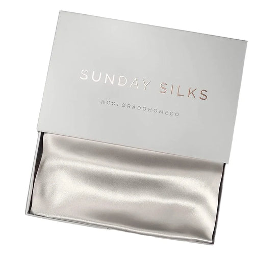 Silk pillowcase in a white box with 'Sunday Silks' branding on a white background