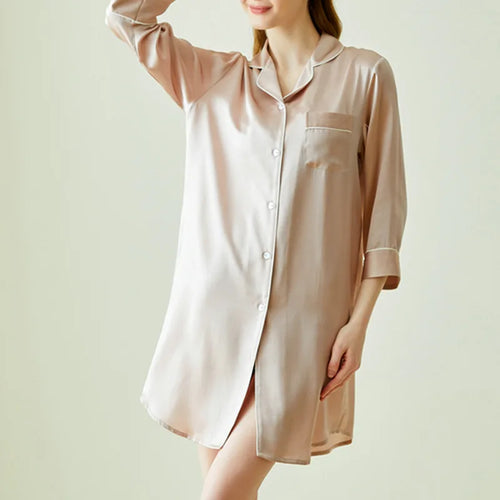 Beige satin nightshirt worn by a model on a plain background