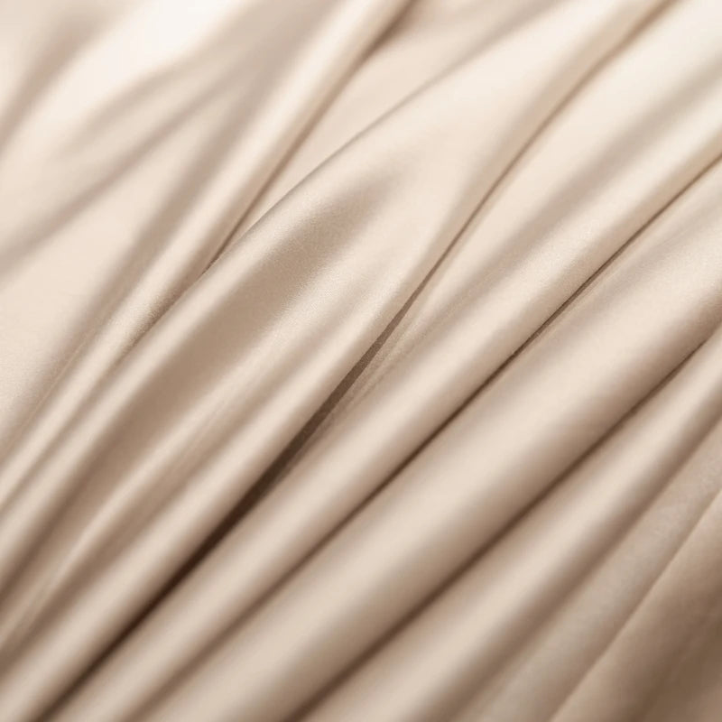 Close-up of beige fabric with folds