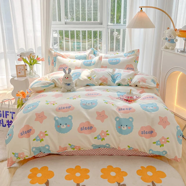 Children's bedroom with teddy bear-themed bedding and decor.