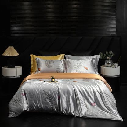 Bed with gray and yellow bedding in a darkly decorated room