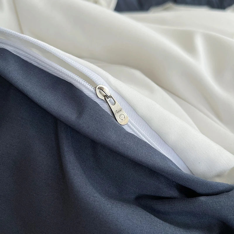 Close-up of a zipper on a piece of fabric with a neutral background