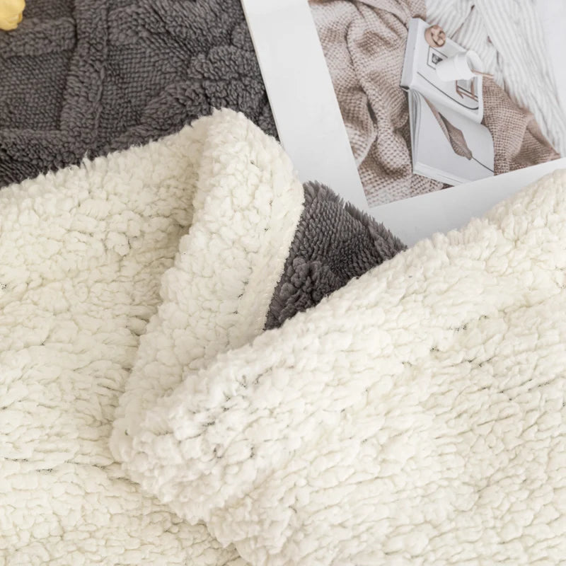 Close-up of textured fabric in gray and white colors.