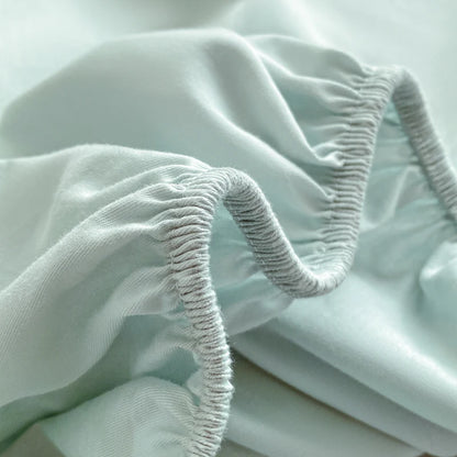 Close-up of light green fabric with textured edge