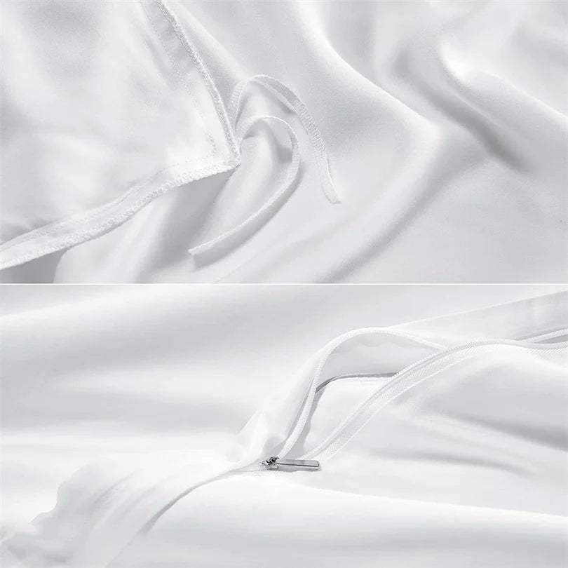 Close-up of white satin fabric with a zipper detail.