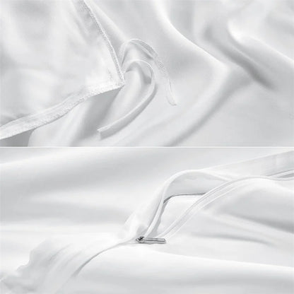 Close-up of white satin fabric with a zipper detail.