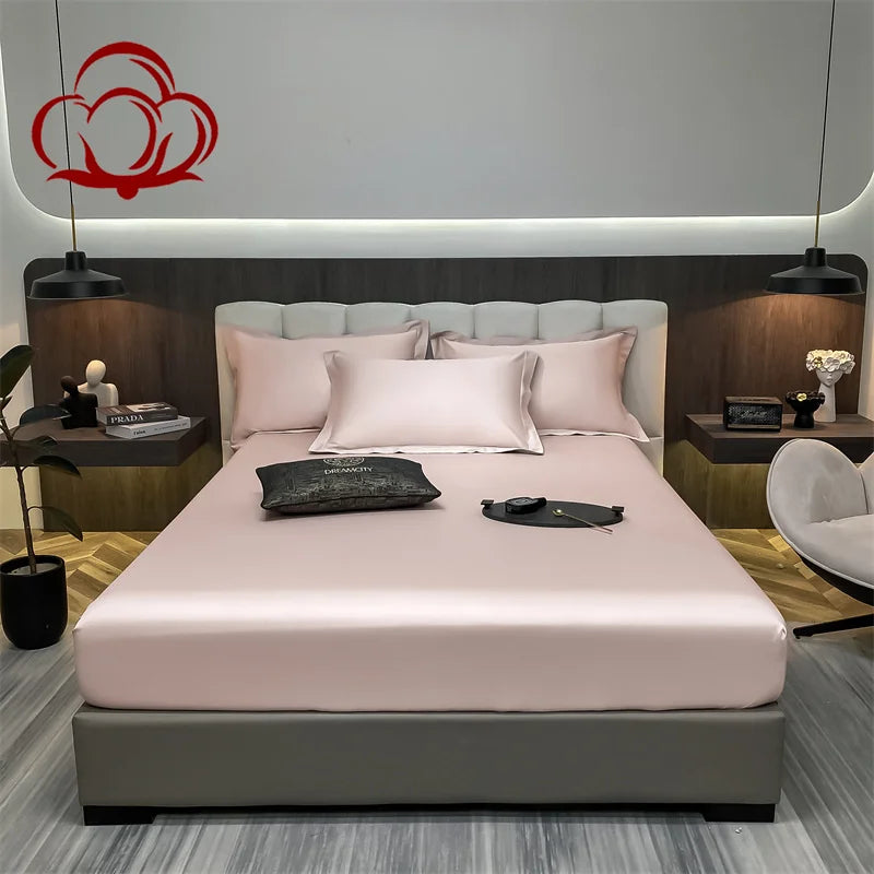 Modern bedroom with a bed, nightstands, and decorative items.