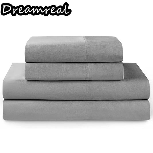 Gray bedding set with three pieces on a white background, featuring the brand 'Dreamreal'.