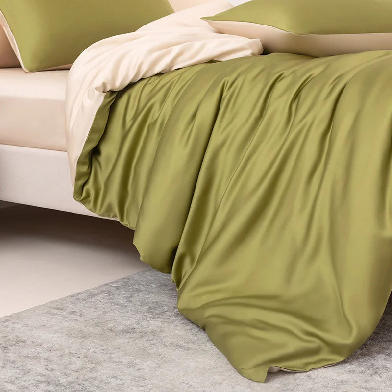 Green bedspread on a bed in a bedroom setting
