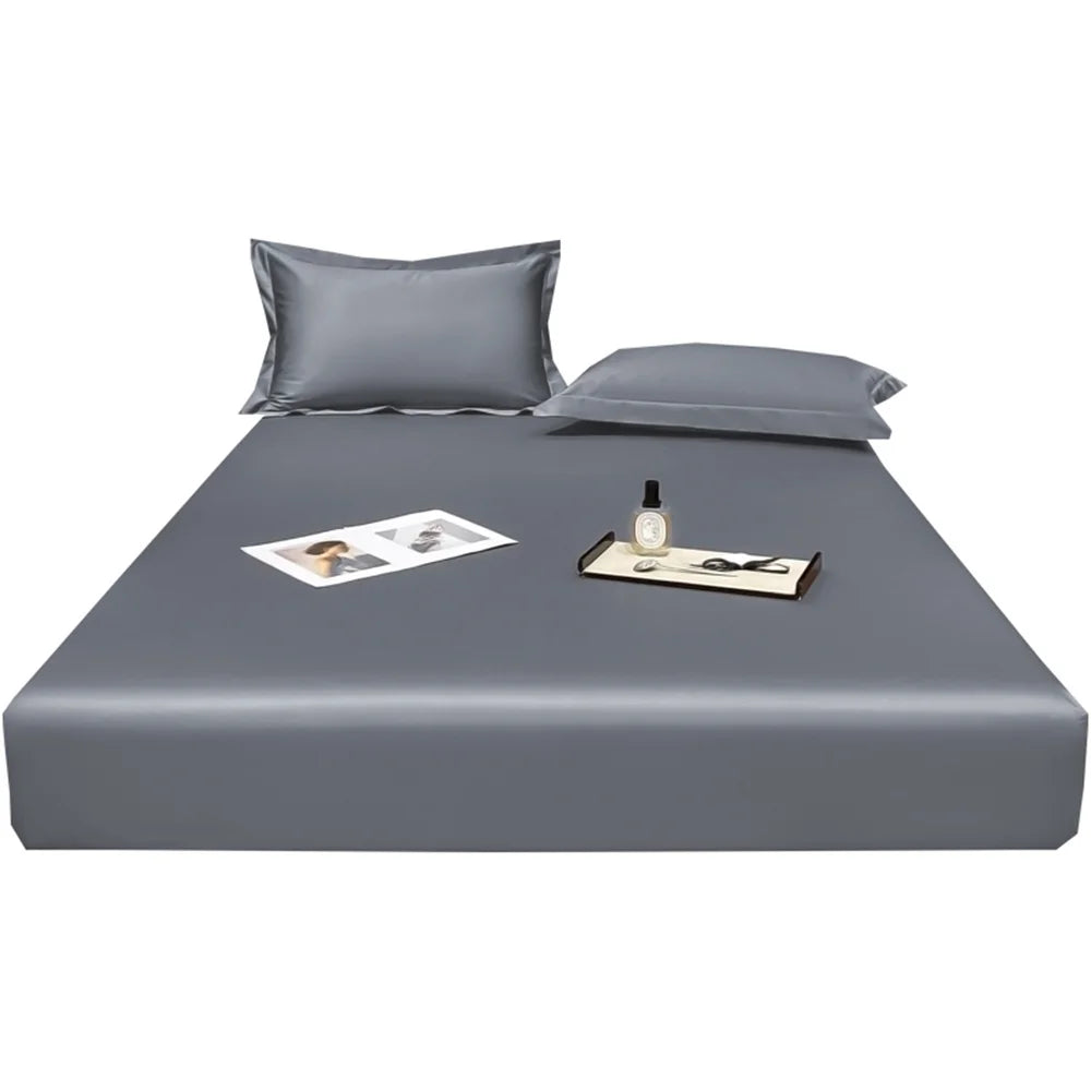 Gray bed sheet set with pillowcases on a white background