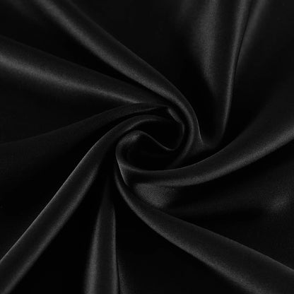 Close-up of black fabric with folds