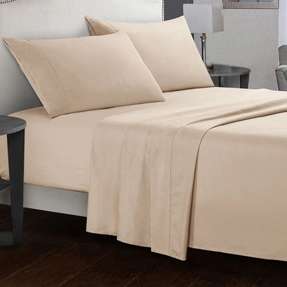 Beige bed sheets and pillows on a bed in a bedroom setting.