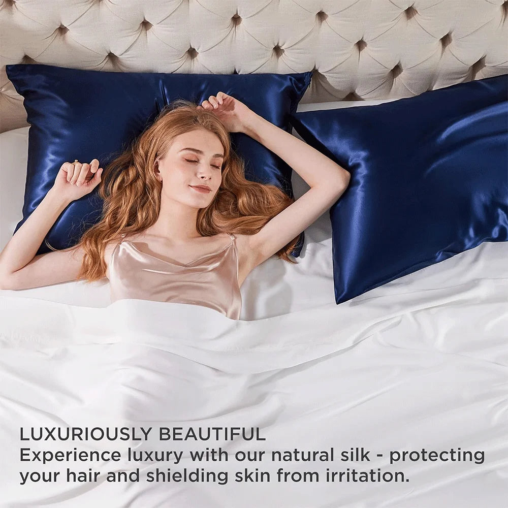 Woman lying in bed with blue satin pillowcases, text about natural silk pillowcases.