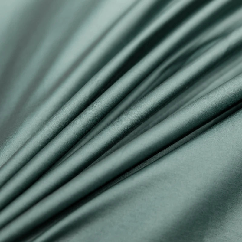 Close-up of Green fabric with folds