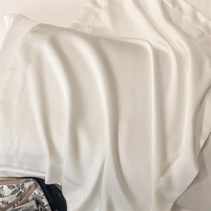 Close-up of smooth, beige fabric with a slight sheen.