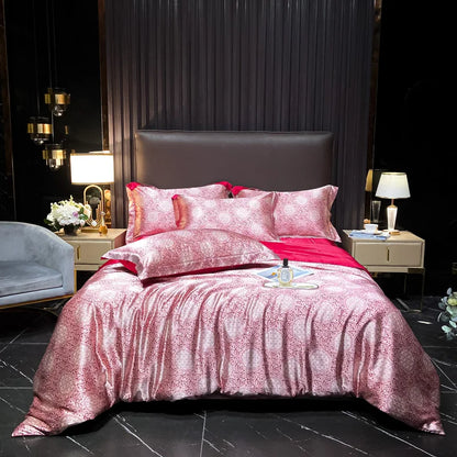 Pink and red patterned bedding set on a bed in a stylish bedroom.