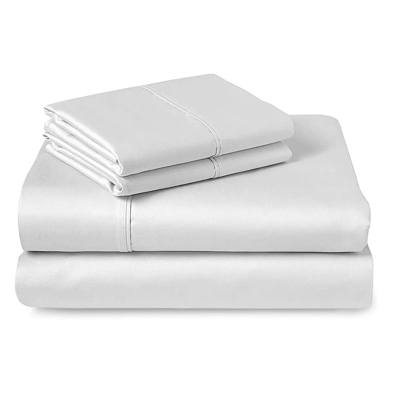 Folded white bed sheets on a white background