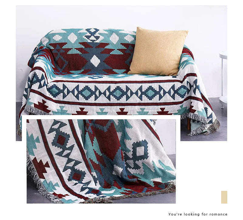 Geometric patterned throw blanket with fringe on a couch, with a close-up inset.