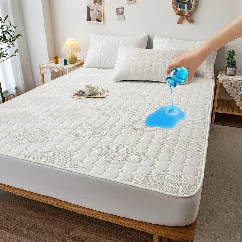 Person using a blue spray bottle on a mattress in a bedroom setting.