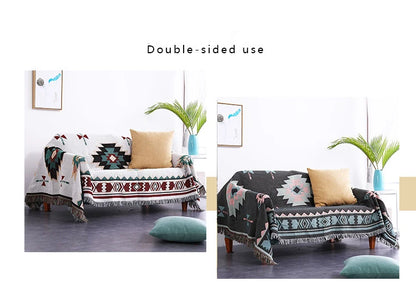 Sofa with a patterned throw blanket in a living room setting