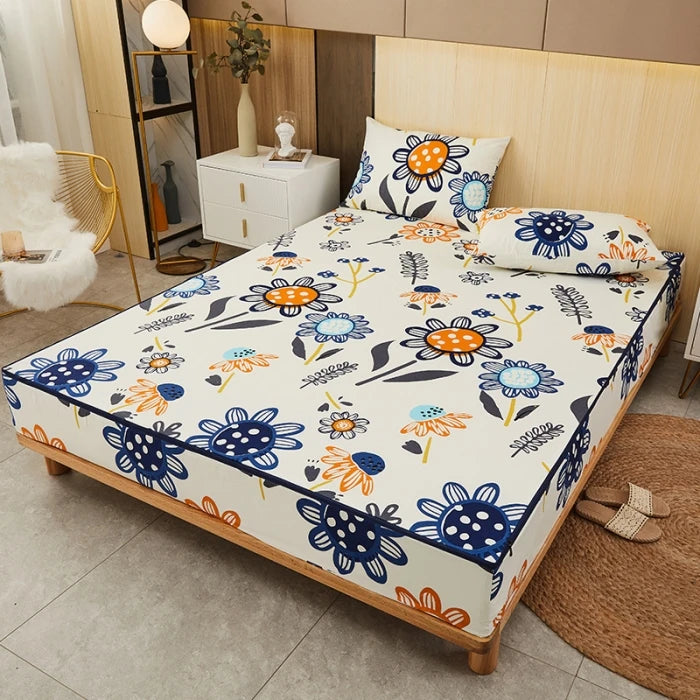 Bed with floral patterned bedspread in a bedroom setting