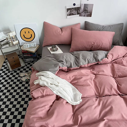 Bedroom with pink and gray bedding, checkered floor, and decor items.