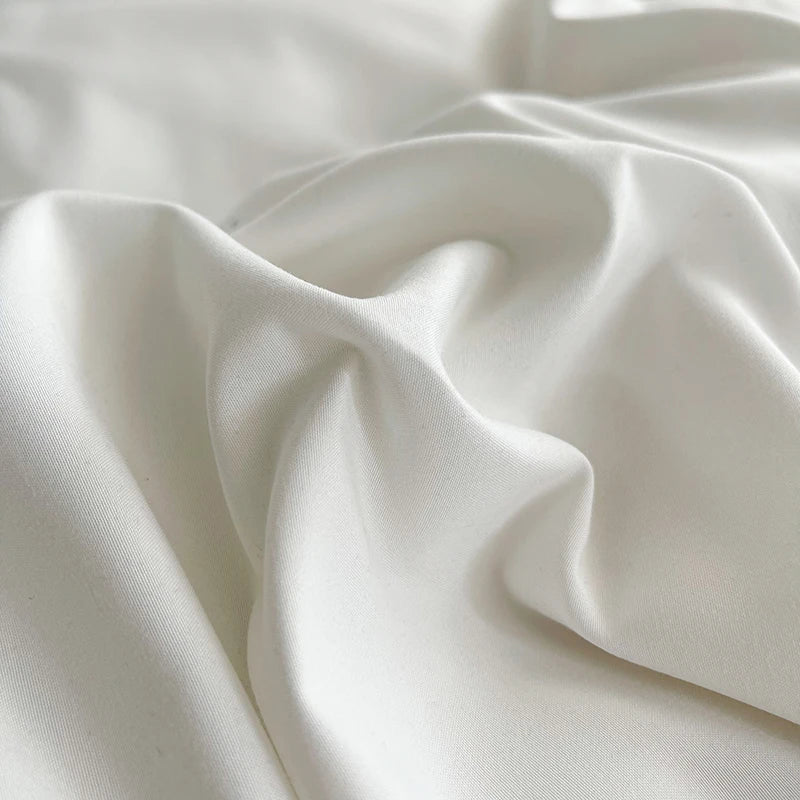 Close-up of white fabric with folds