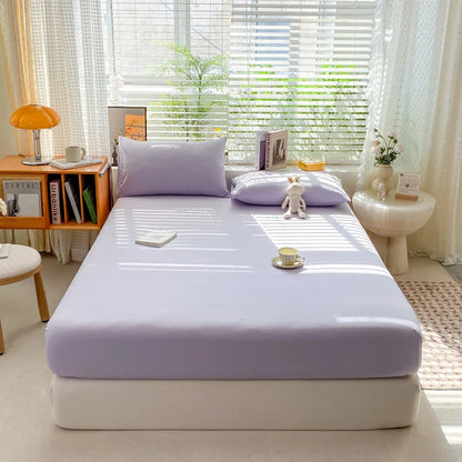 Bed with a purple mattress cover in a bright bedroom