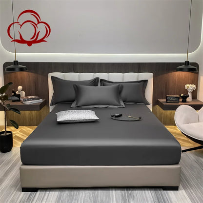 Modern bedroom with a bed, nightstands, and decor elements.