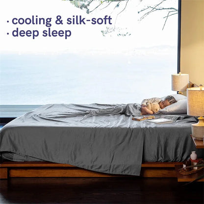 Person lying in bed with gray bedding, text 'cooling & silk-soft, deep sleep' above.