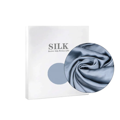 Silk product packaging with a close-up of silk fabric on a white background