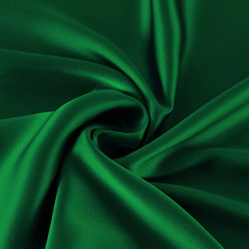 Close-up of green fabric with folds