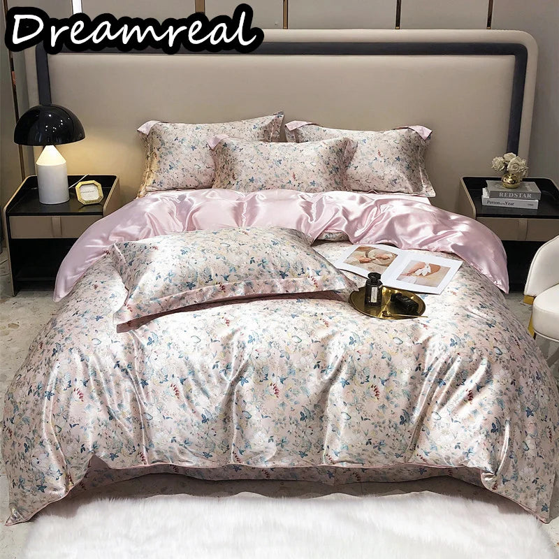 Floral bedding set on a bed with 'Dreamreal' branding.