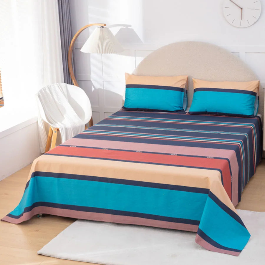 Bed with colorful striped bedding in a bedroom setting