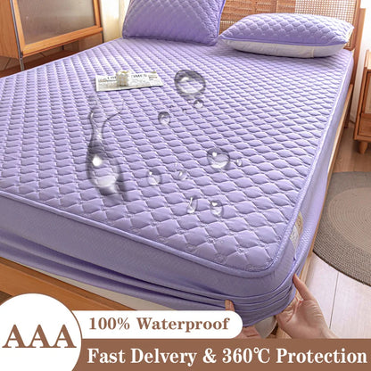 Purple mattress cover with water droplet graphics on a bed, indicating waterproof feature.