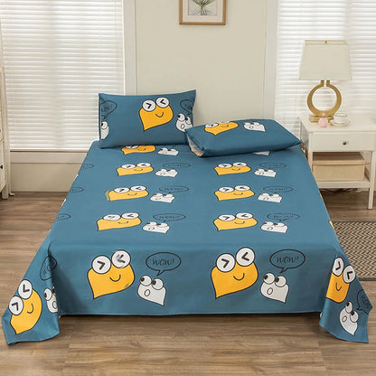 Blue bedspread with cartoon character design on a bed in a room with a lamp and window blinds.