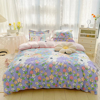 Children's bedroom with a bed featuring a floral and bunny design, surrounded by furniture and decor.