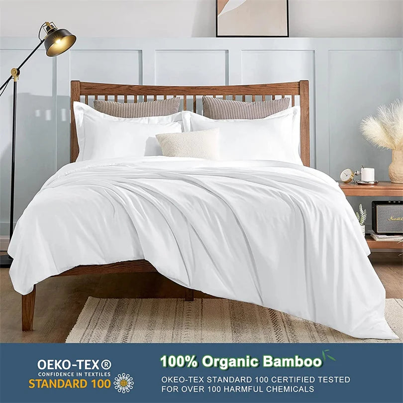 Bed with white bedding and wooden headboard in a bedroom setting, featuring OEKO-TEX certification.