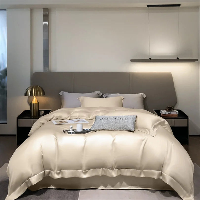 Modern bedroom with a bed featuring beige bedding and decorative pillows.