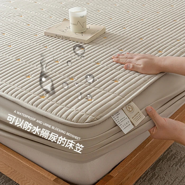 Beige mattress cover with text on a wooden bed frame