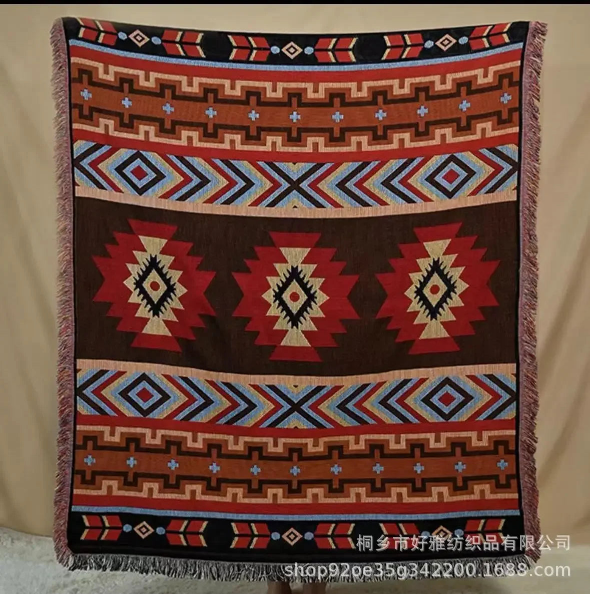 Decorative blanket with geometric pattern on a plain background