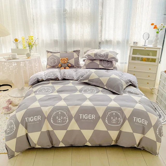 Bedding set with geometric pattern and 'Tiger' branding in a bedroom setting.