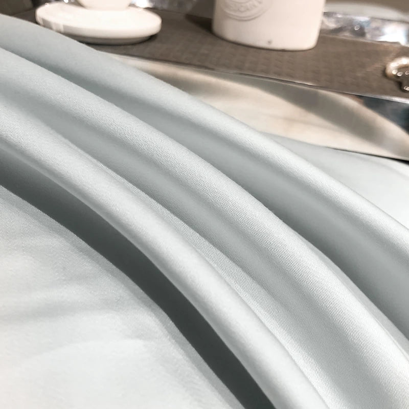 Close-up of a gray fabric with a kitchen sink in the background