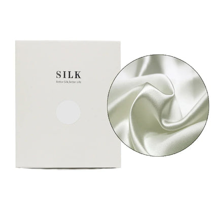 Silk product with a close-up of silk fabric and a branded box on a white background