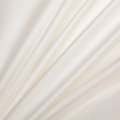 Close-up of white fabric with subtle texture